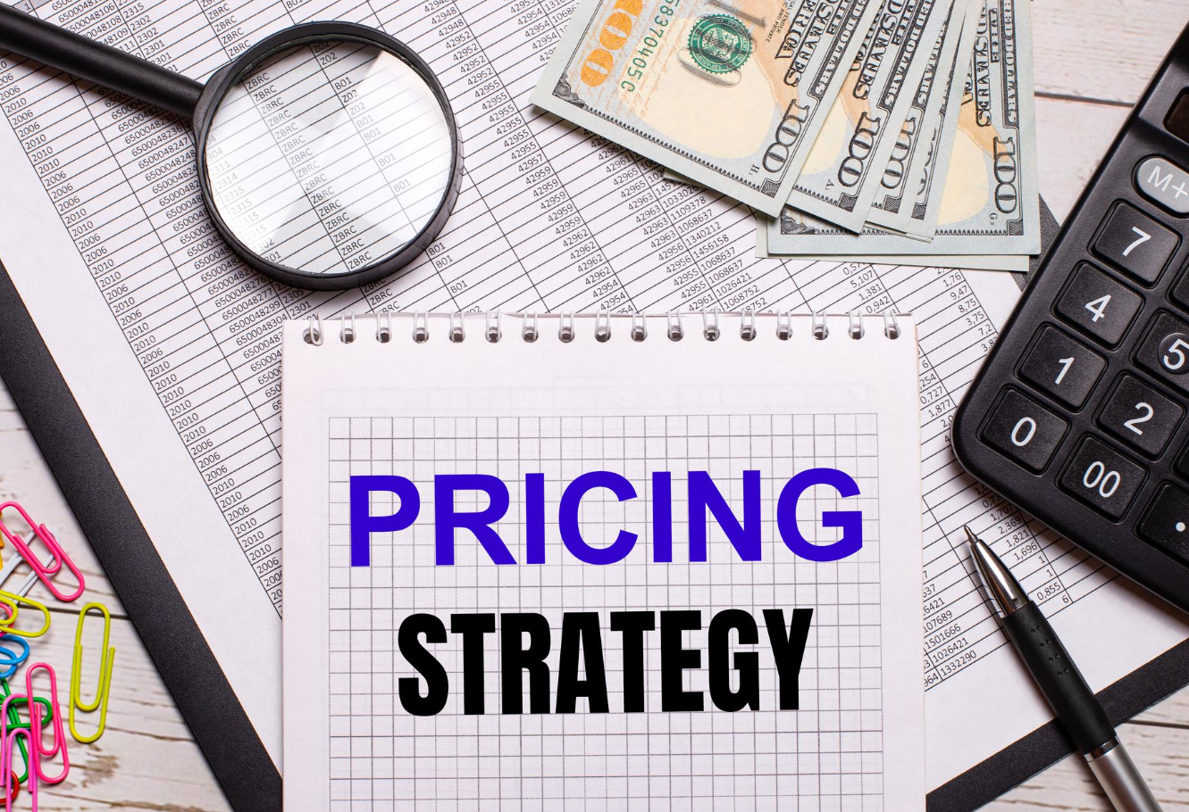 A notebook cover with the text "pricing strategy"