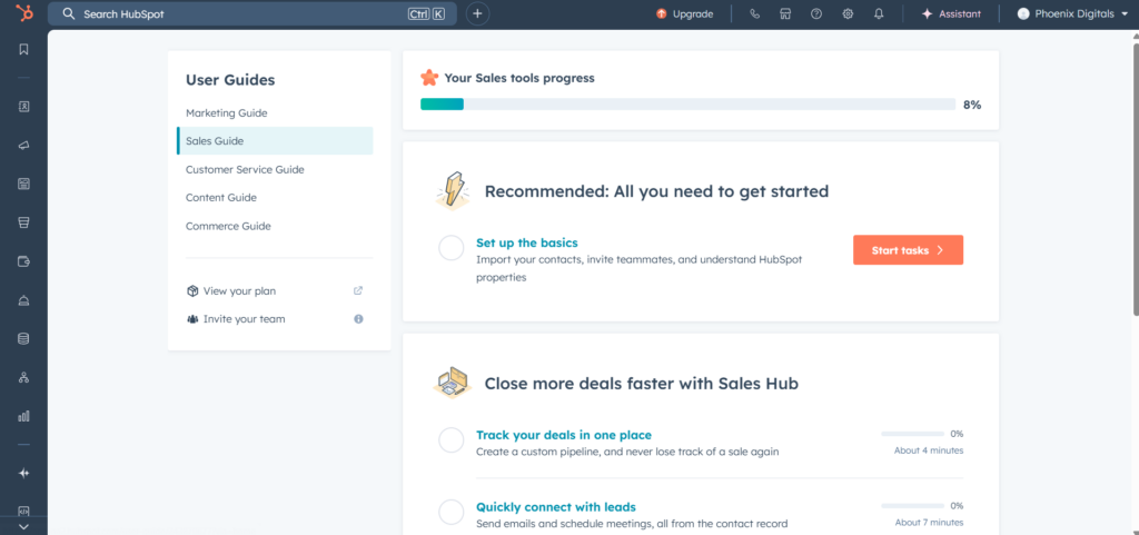 A screenshot of the HubSpot User Guides page. The main section is "Your Sales tools progress," showing a bar that is 8% complete. Below it is the "Recommended: All you need to get started" section, with a checklist and a "Start tasks" button. At the top right, a profile icon says "Phoenix Digitals."